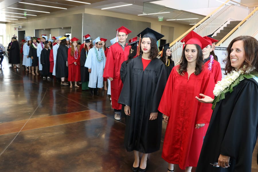 My daughter's high school graduation with photos of the ceremony — Class of 2019 plus her journey from homeschool to high college program.
