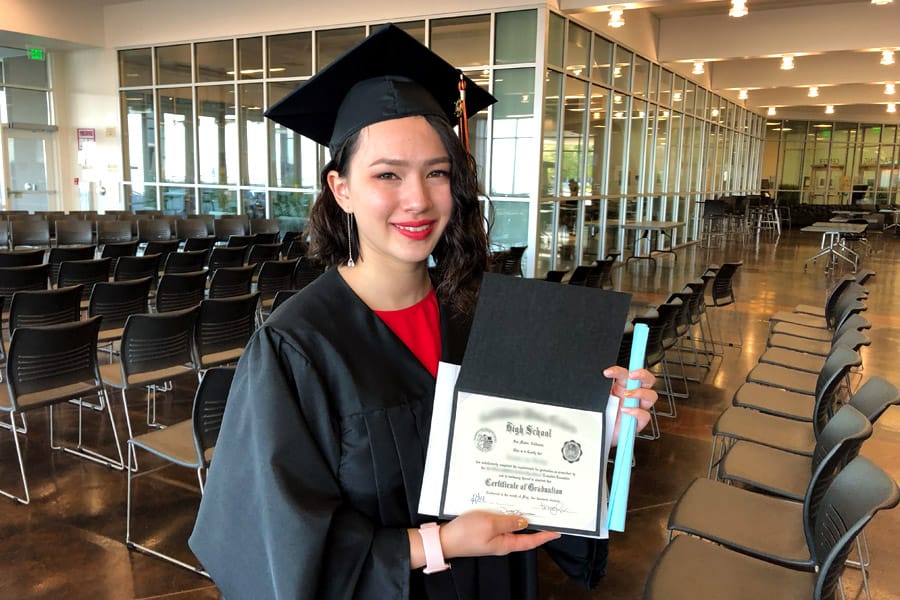 My daughter's high school graduation with photos of the ceremony — Class of 2019 plus her journey from homeschool to high college program; High school diploma