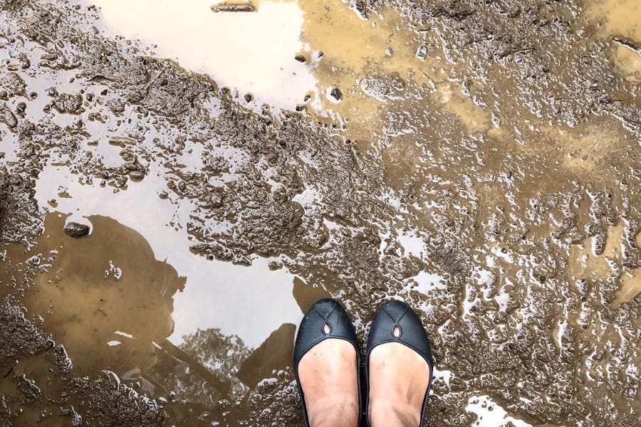 Kauai ATV Waterfall tour with family / teens in Ohana Bug in Kauai Hawaii Dirt Mud Puddle
