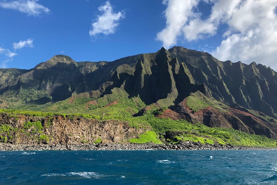Top things to do in Kauai Hawaii — Kauai Napali Coast boat tour / Na Pali Coast sunset cruise