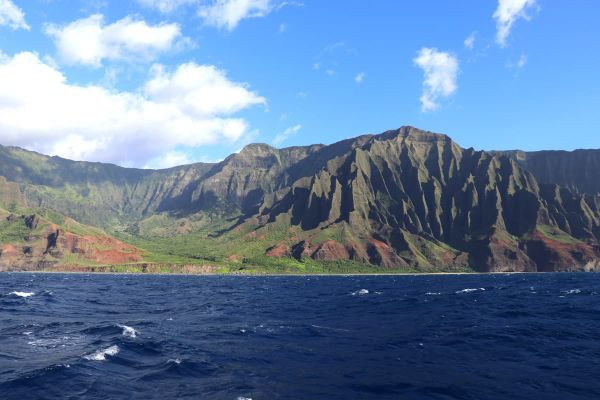 Top things to do in Kauai Hawaii — Kauai Napali Coast boat tour / Na Pali Coast sunset cruise