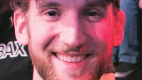 Jason Somerville smiling at a poker event.