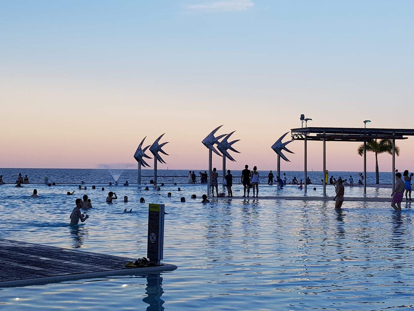 Sunset over the Lagoon Pool on the esplanade in Cairns