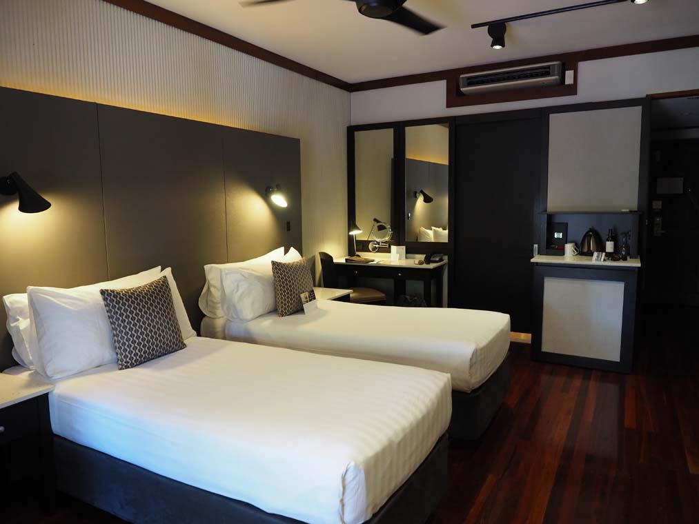 View of the twin beds in a Cable Beach Club Resort