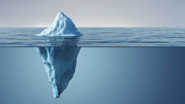 Governance treats cost as a rare event. Finance experiences cost on every execution.