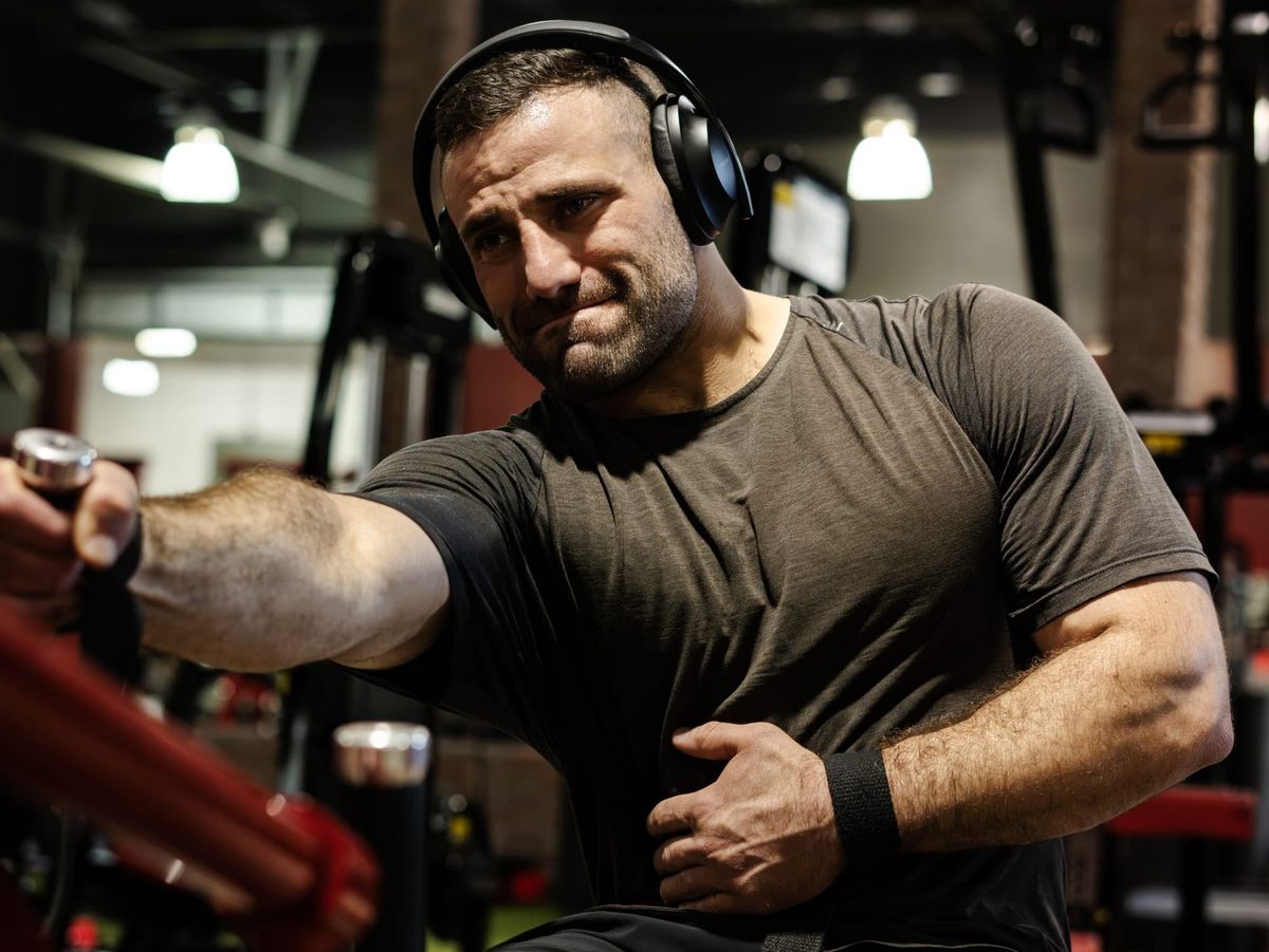 An image of a man working out in the gym