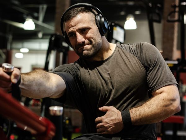 An image of a man working out in the gym