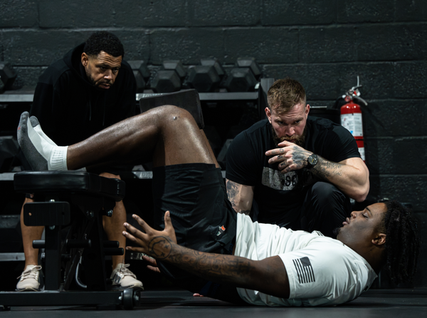 Pre-script trainers working with a student