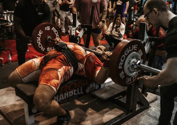 Heavy bench press at powerlifting competition