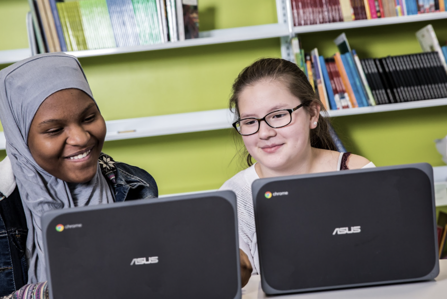 Students reading a funny short story from the CommonLit library