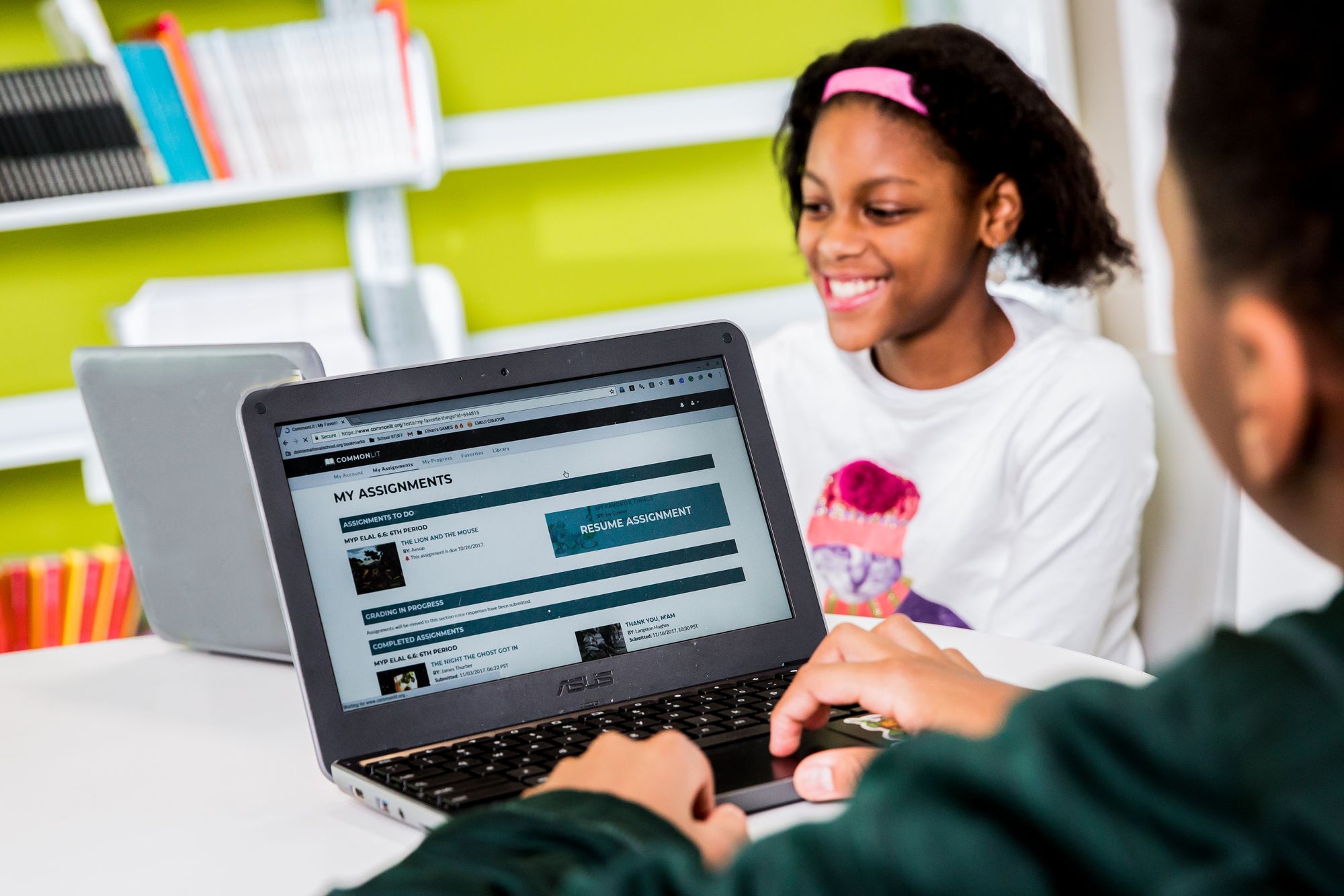 A student views winter poems from CommonLit on her computer.
