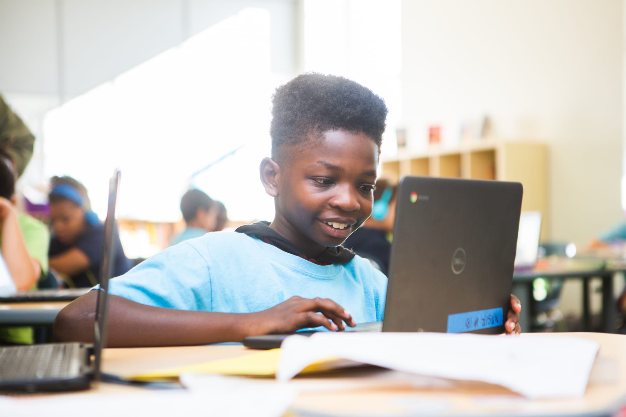 Student working on his laptop.