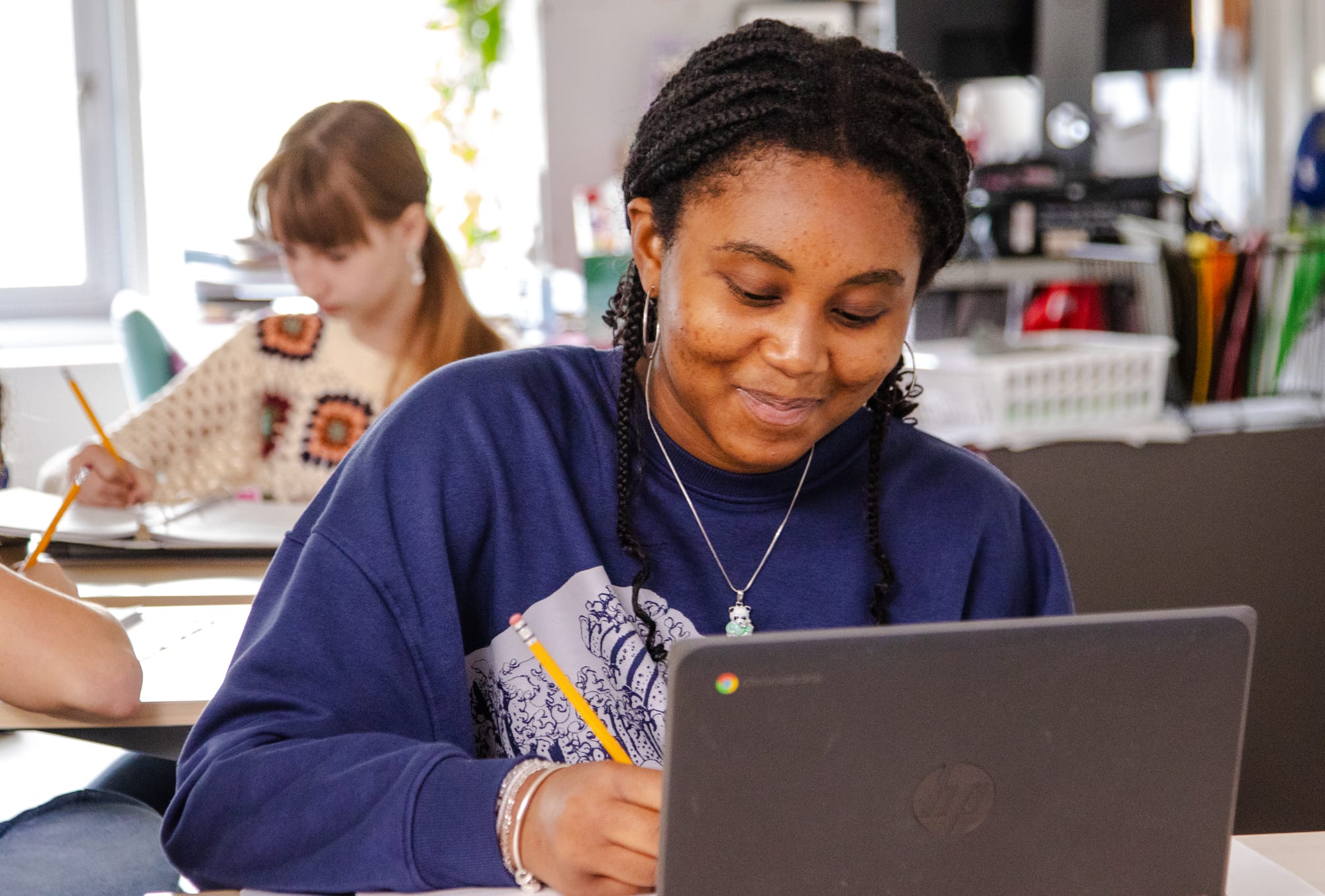 A high school student in a CommonLit 360 classroom