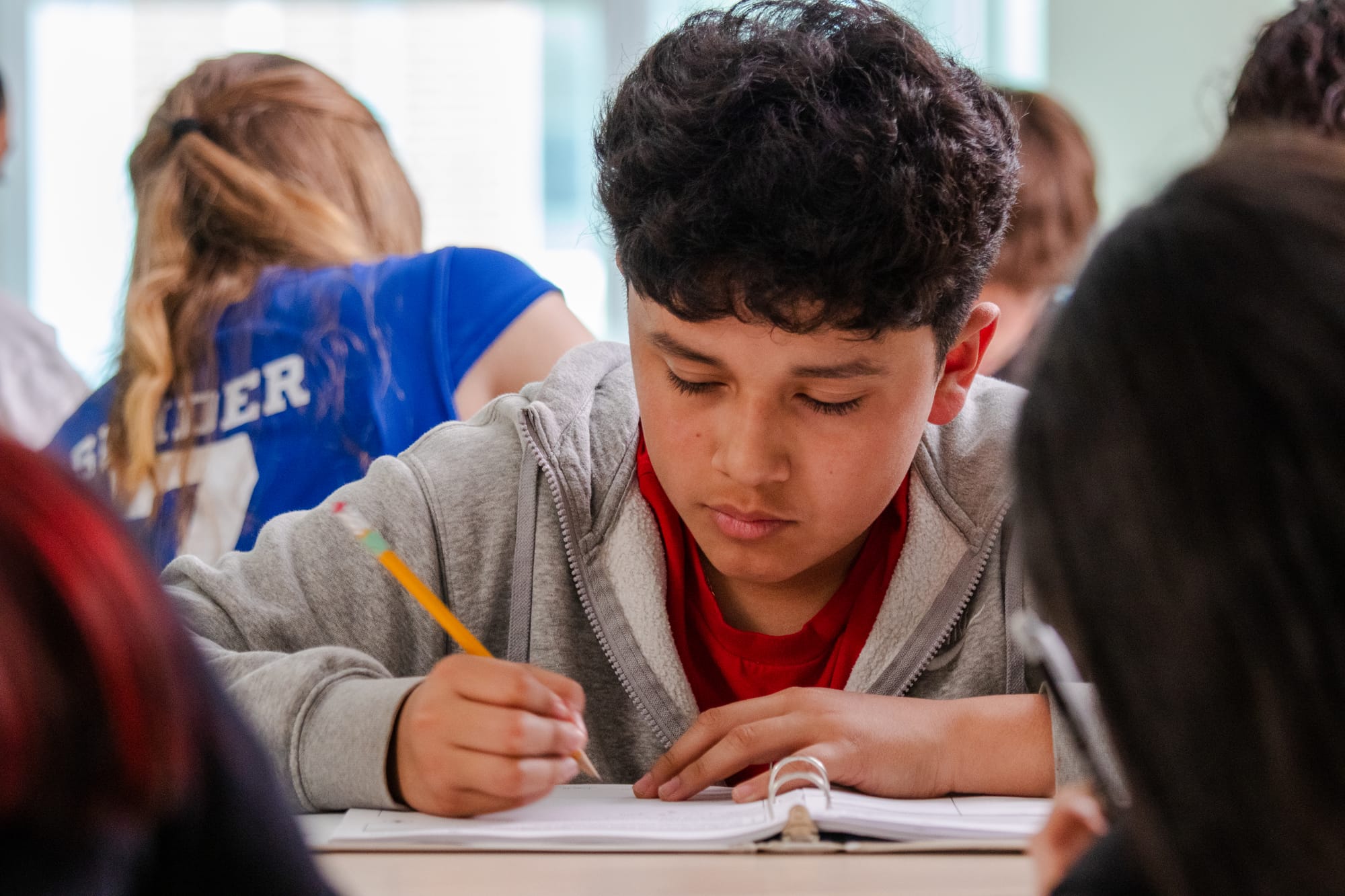 A middle school student in a CommonLit ELA classroom.