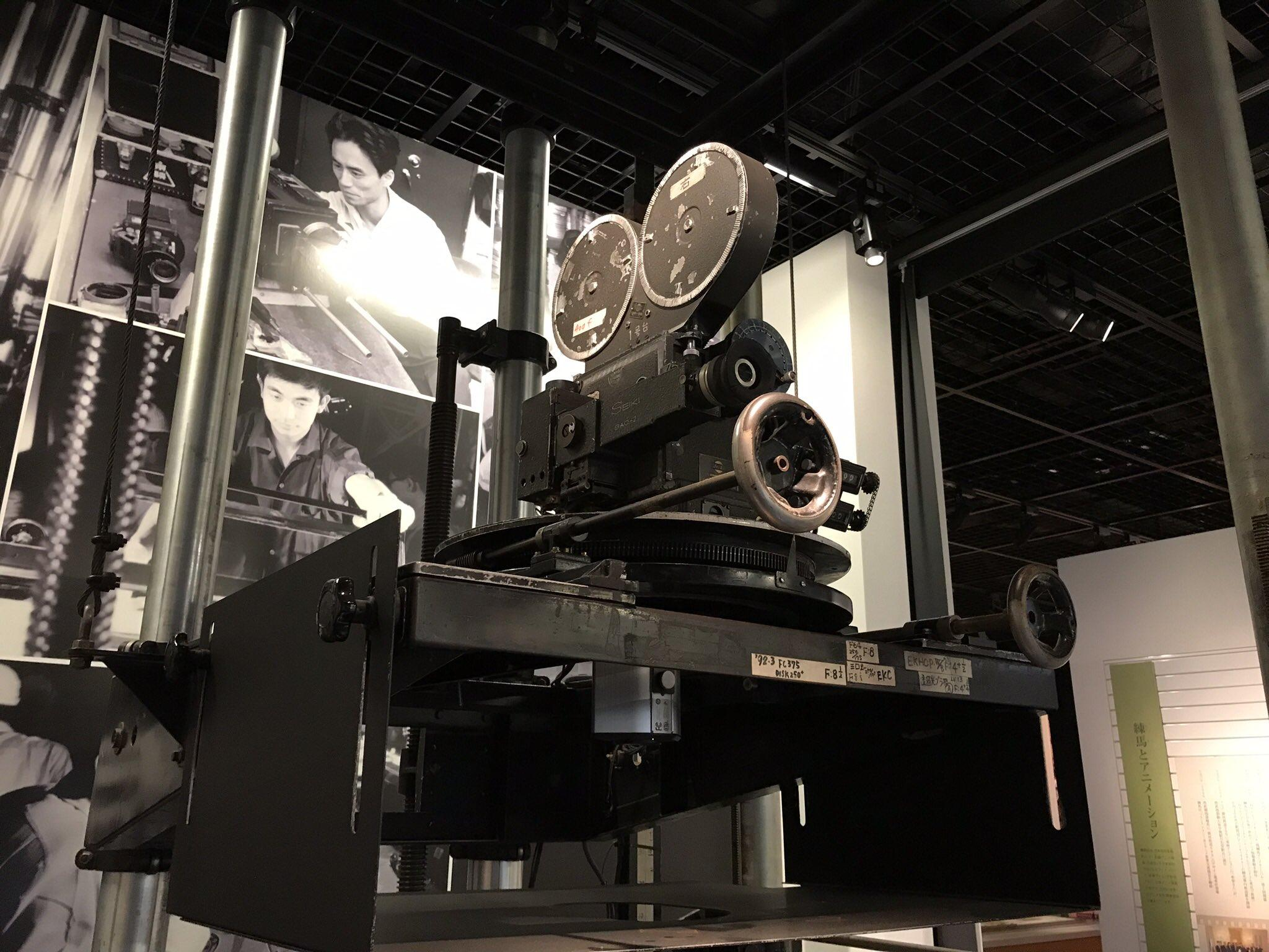 Historic animation filming machine with an overhead camera used in Toei Animation's traditional production process.