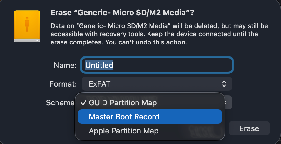 Screenshot of macOS Disk Utility Erase options, highlighting the need to switch Sceme to Master Boot Record.