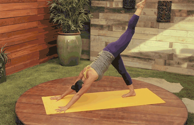 Yoga instructor doing a complicated yoga pose, gif