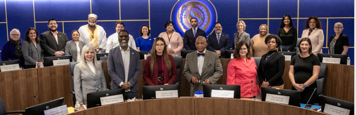 Members of the Chicago Board of Education, with President Sean Harden in the center of the back row.