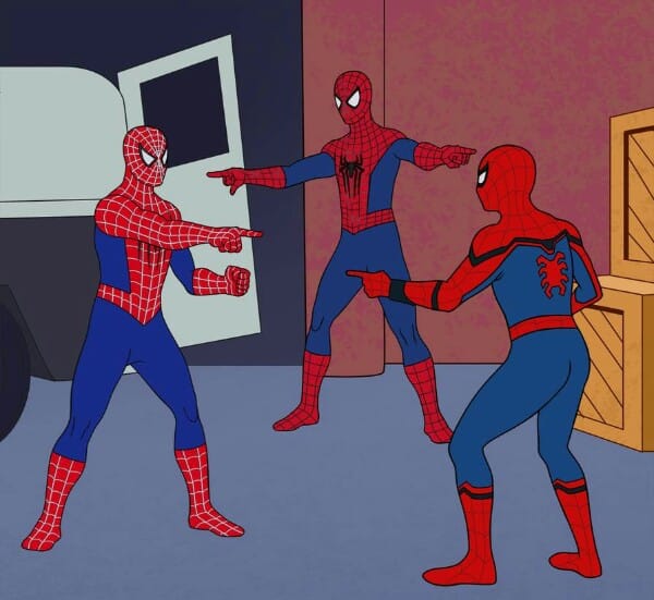 Three Spider-Men pointing at each other
