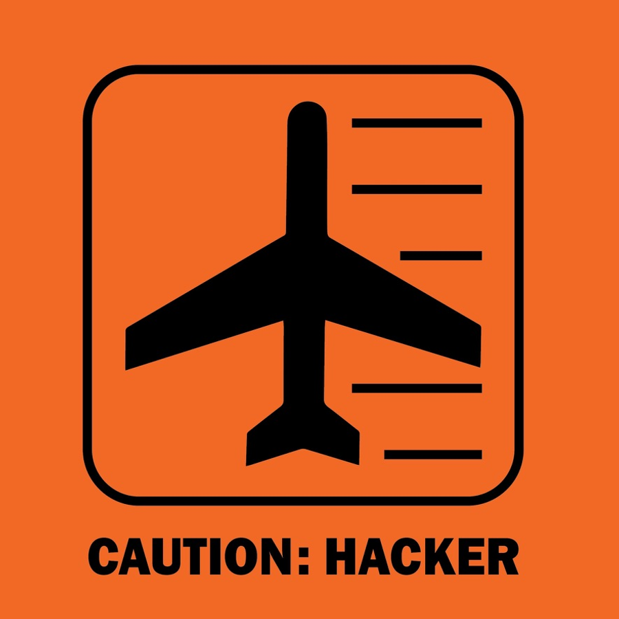 An aviation hazard placard in black on safety orange: a rounded square containing an airplane silhouette and speed lines, captioned "CAUTION: HACKER".