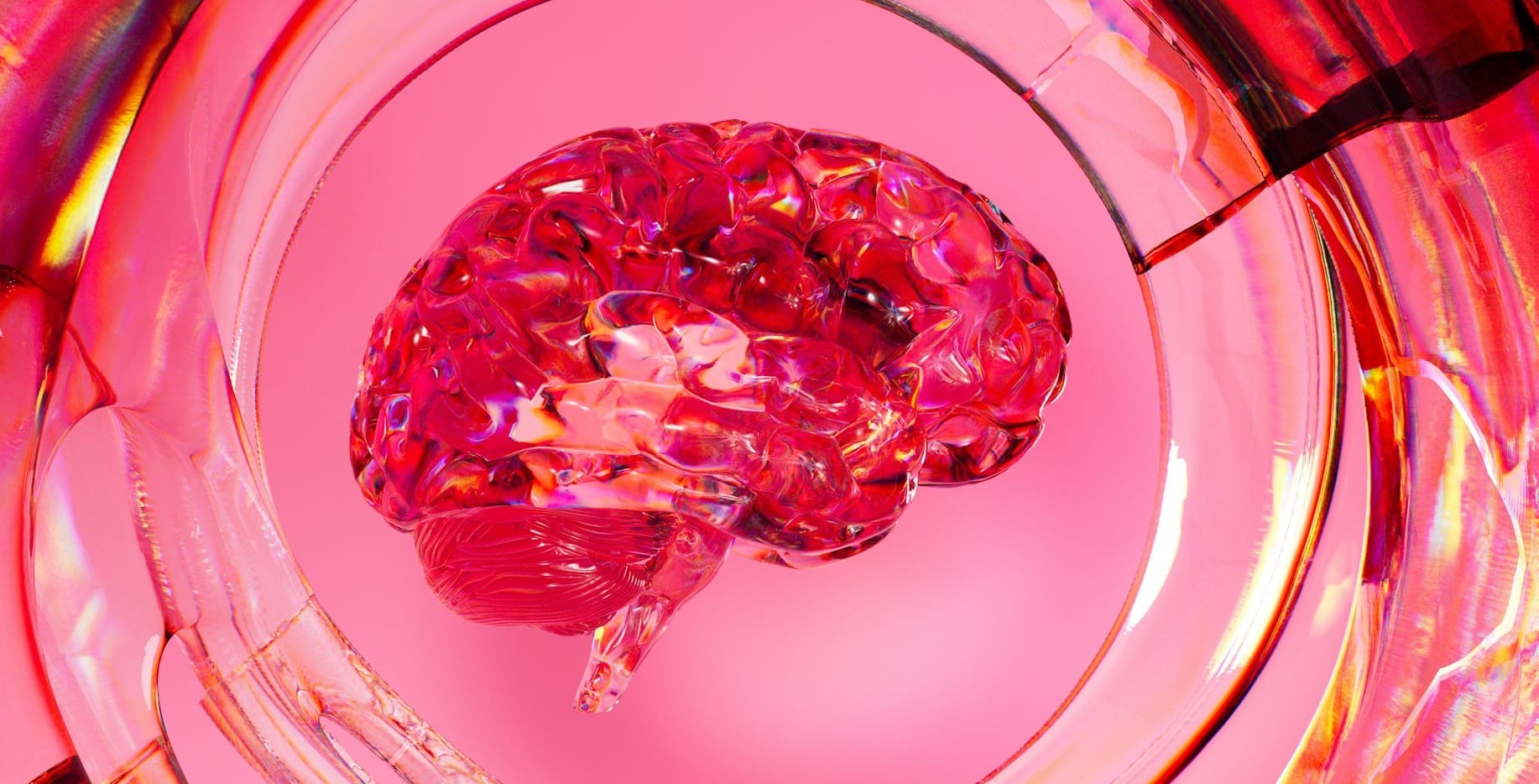 A close up of a glass with a pink substance in it