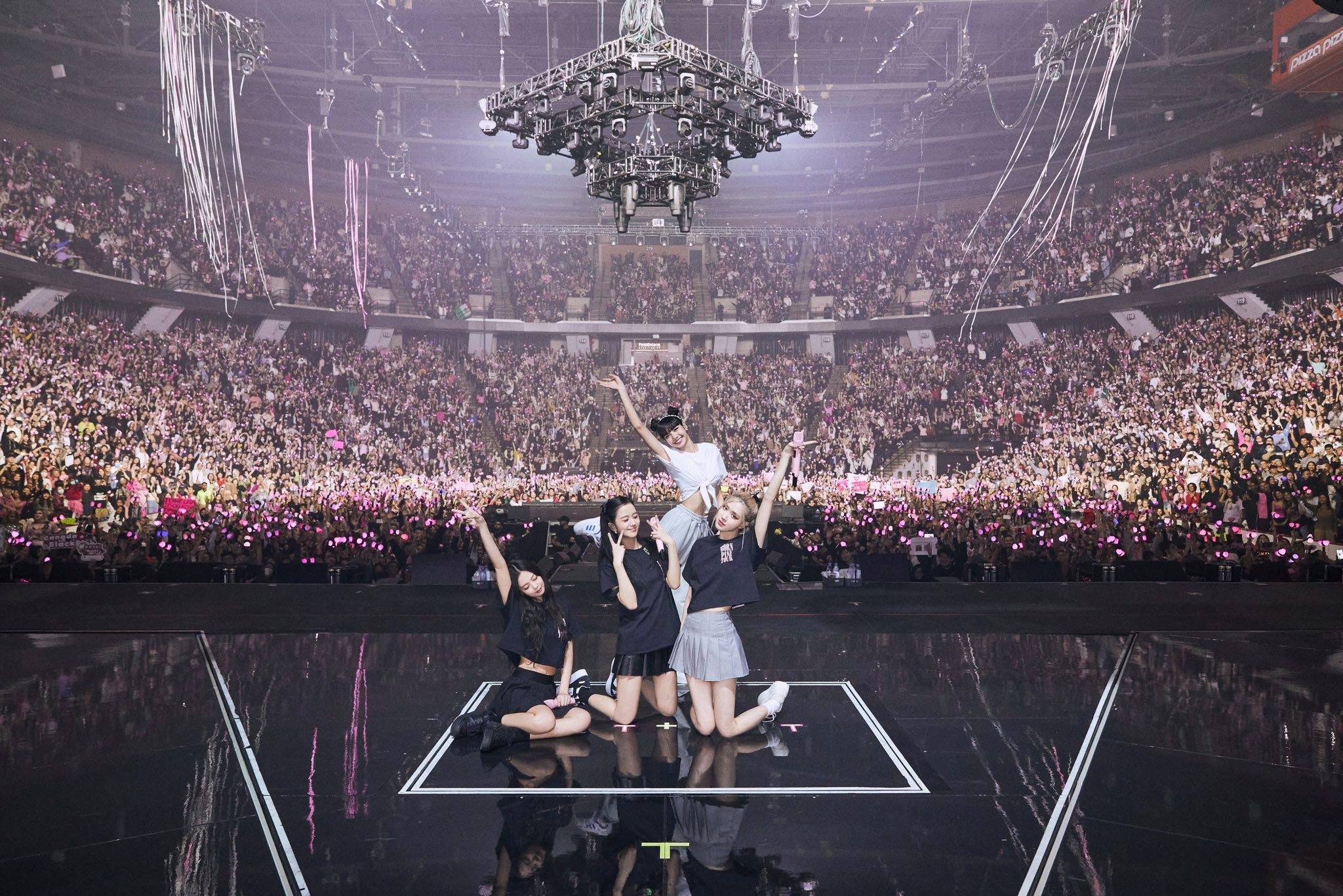 Blackpink with concert crowd