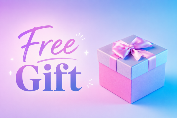 Pastel pink and blue gradient feature image with the words ‘Free Gift’ in large decorative lettering beside a wrapped gift box with a pink ribbon.