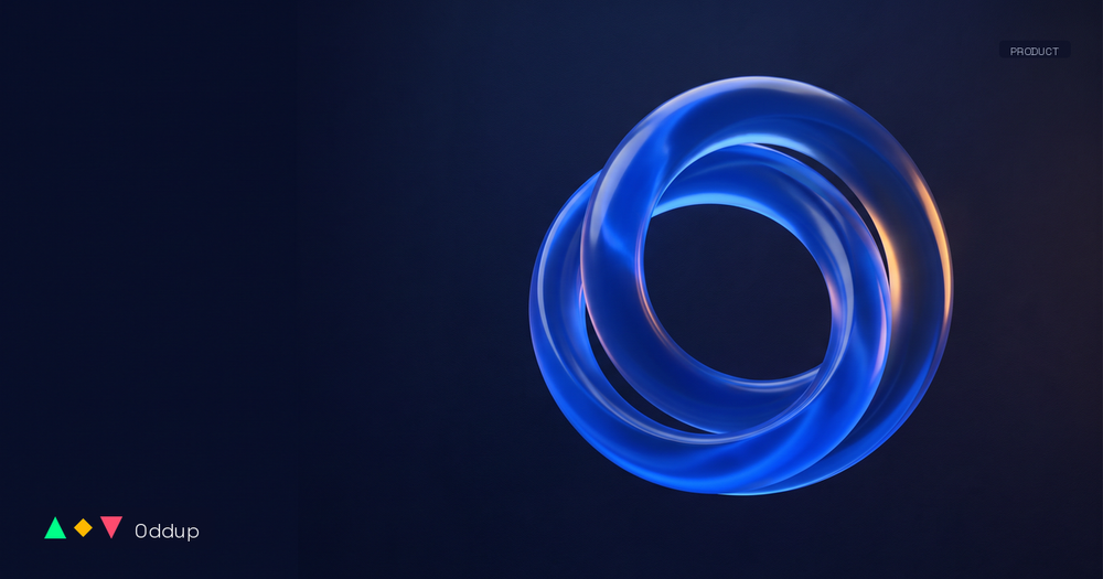 Editorial cover: interlocking sculptural rings in electric blue with an amber rim-light, on a deep navy studio background. Oddup logo bottom-left.