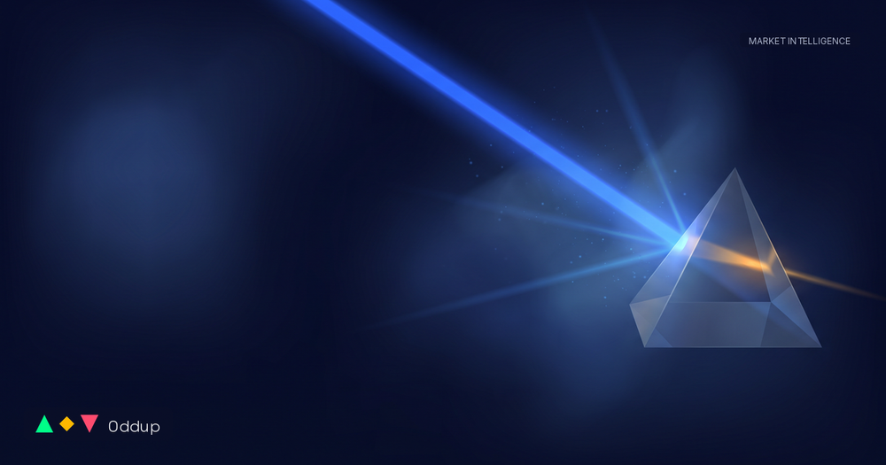 Editorial cover: an electric blue light beam refracts through a glass prism into a warm amber ray on a deep navy canvas. Oddup logo bottom-left.