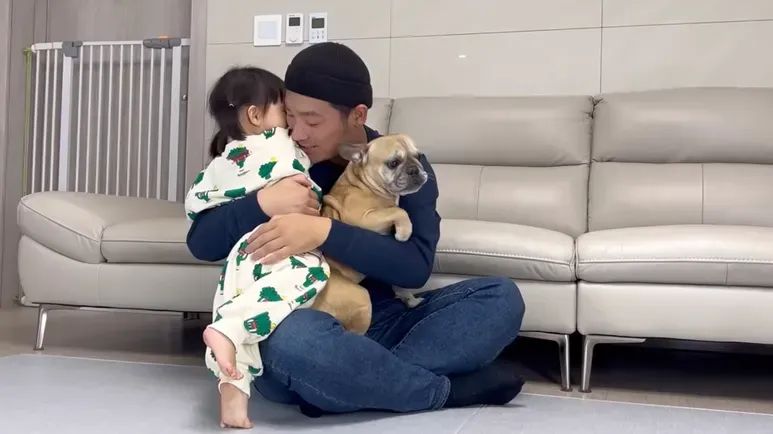 babies love hugs; sometimes dogs do not