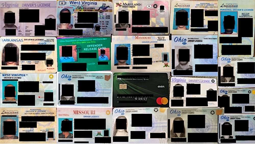 A redacted screenshot of a ton of driver's licenses and other ID cards that were exposed to the web.