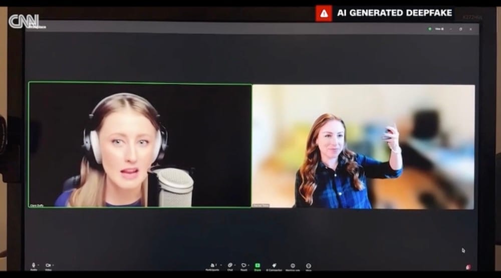 a screenshot from the CNN video, showing a computer screens with a deep-faked person on the left, and Rachel Tobac on the right holding up a phone.