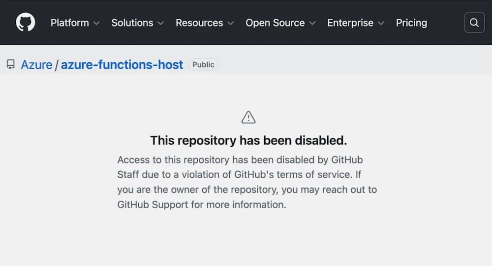 a screenshot from a Microsoft-owned GitHub repo, saying: "This repository has been disabled. Access to this repository has been disabled by GitHub Staff due to a violation of GitHub's terms of service. If you are the owner of the repository, you may reach out to GitHub Support for more information."