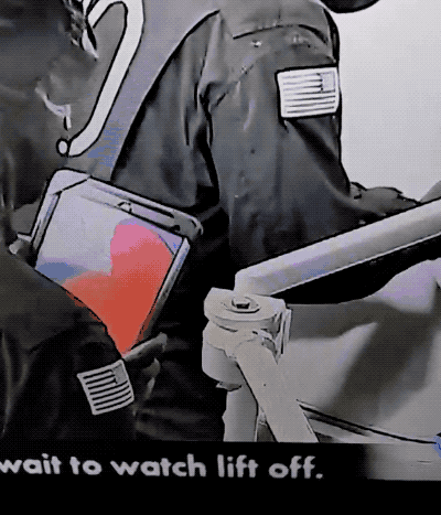 an animated GIF of an astronaut on an iPad, entering the passcode "1111" on the live stream.