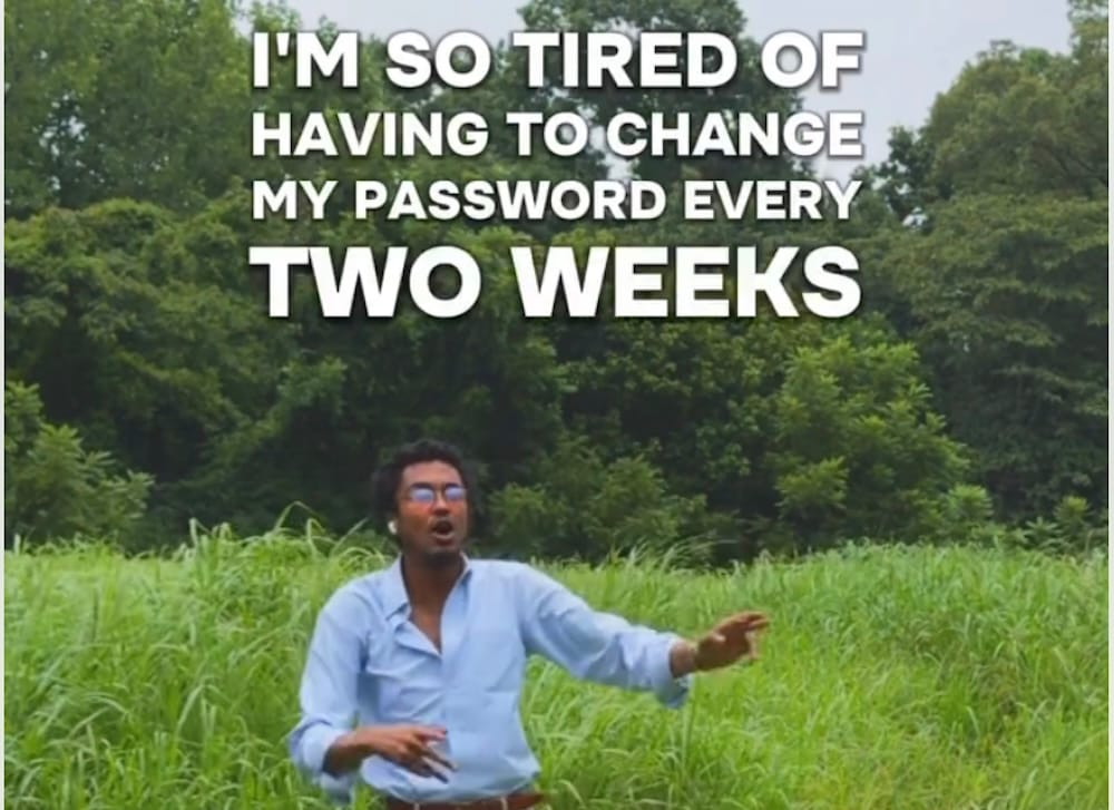 a photo of comedian Julian Cross, in a grassy field, with the overlay text: "I'm so tired of having to change my password every two weeks."