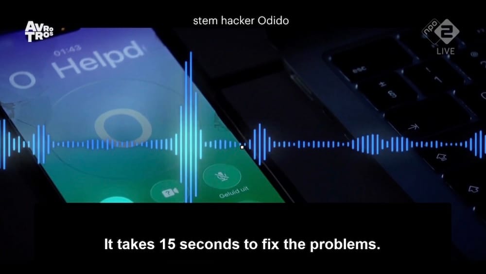 a screenshot from the Dutch Police video, showing a still of the recorded call, which says as the closed caption — "It takes 15 seconds to fix the problems," as spoken by the hacker.