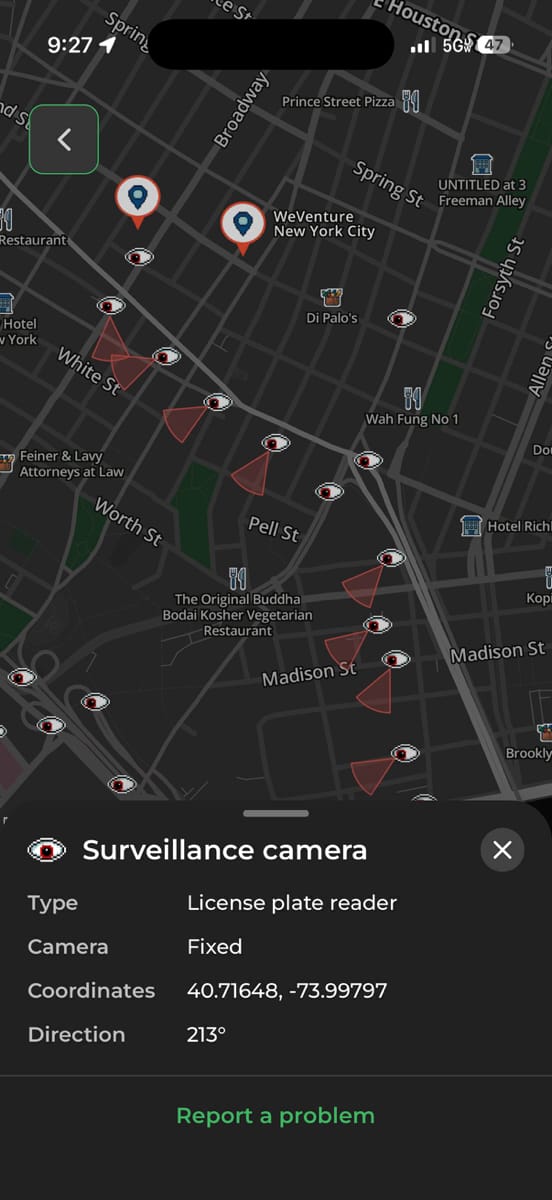 a screenshot from a MapQuest app on an iPhone showing a close-up of a bunch of license plate readers on the same street in New York City