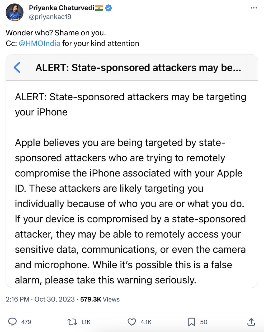 Priyanka Chaturvedi tweet: "Wonder who? Shame on you," followed by a screenshot of the threat notification she received. The screenshot notice reads: "Apple believes you are being targeted by state-sponsored attackers who are trying to remotely compromise the iPhone associated with your Apple ID. These attackers are likely targeting you individually because of who you are or what you do. If your device is compromised by a state-sponsored attacker, they may be able to remotely access your sensitive data, communications, or even the camera and microphone. While it's possible this is a false alarm, please take this warning seriously."