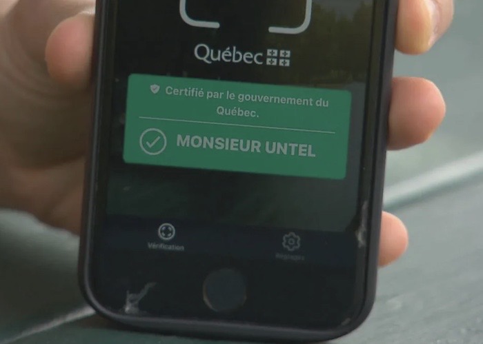 A screenshot of a fake digital vaccine card on Quebec's vaccine passport app, which says (in French) "Mr. So-and-so."