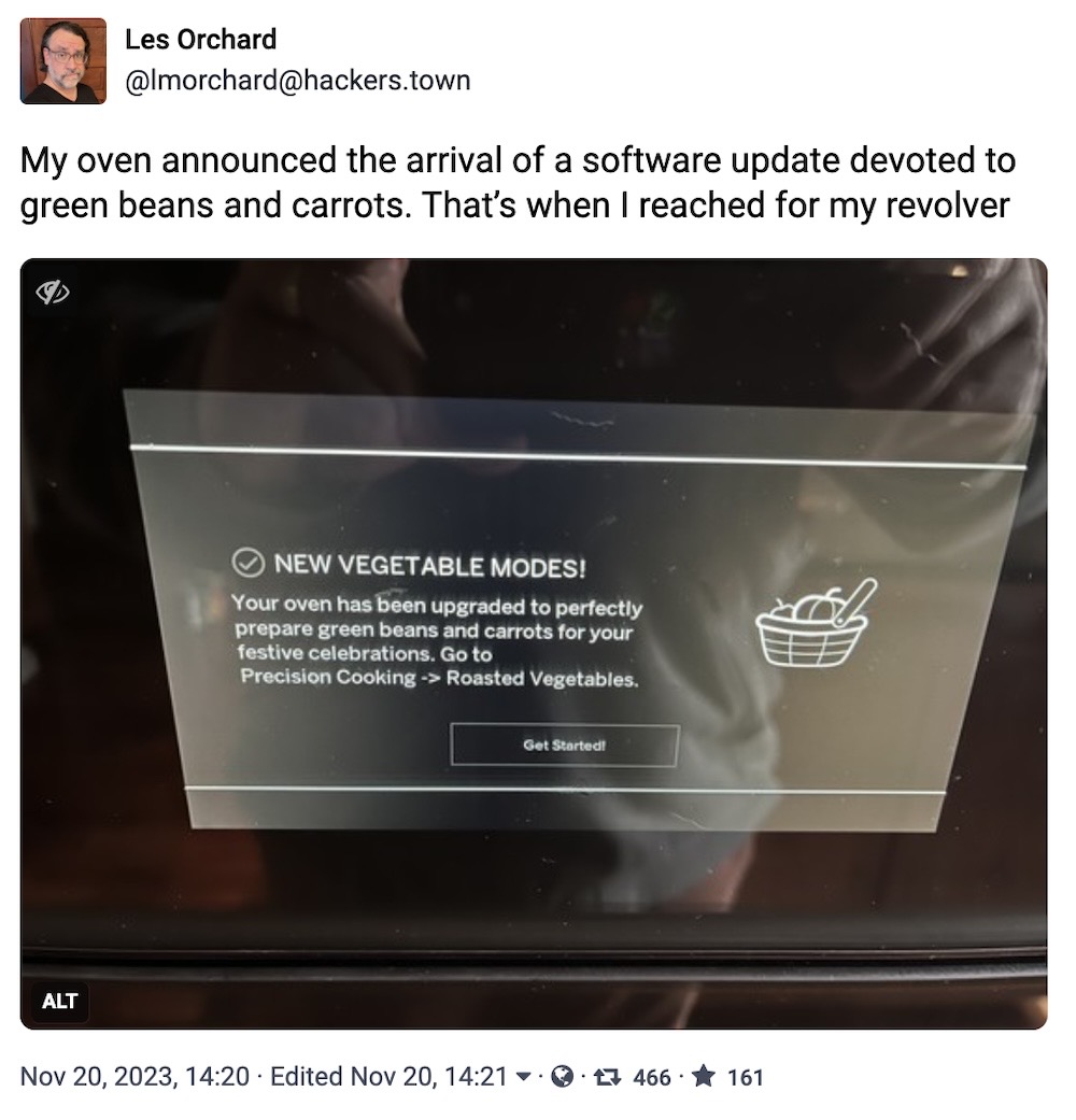 Les Orchard toot: "My oven announced the arrival of a software update devoted to green beans and carrots. That’s when I reached for my revolver," followed by a photo of an oven display that says, "New vegetable modes! Your oven has been upgraded to perfectly prepare green beans and carrots for your festive celebrations."