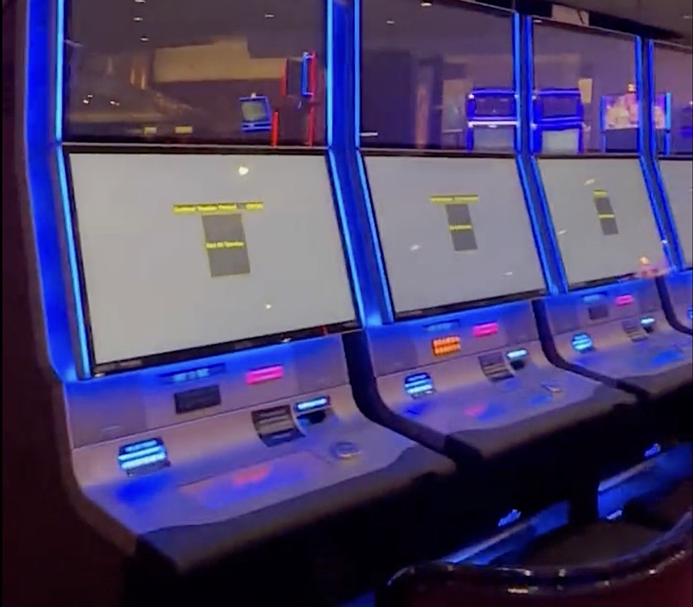 Slot machines in MGM's hotel in Las Vegas displaying error messages on their displays during a cyberattack.