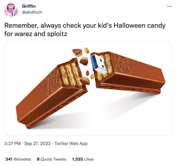 Griffin tweet: "Remember, always check your kid's Halloween candy for warez and sploitz" with a photo of a Kit-Kat finger broken in half revealing a USB port. 