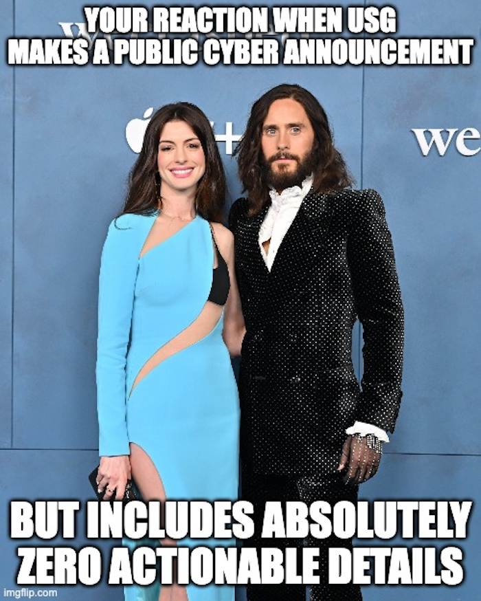 A meme of a straight-faced man with the caption: "Your reaction when the U.S. government makes a public cyber announcement but includes absolutely zero actionable details."