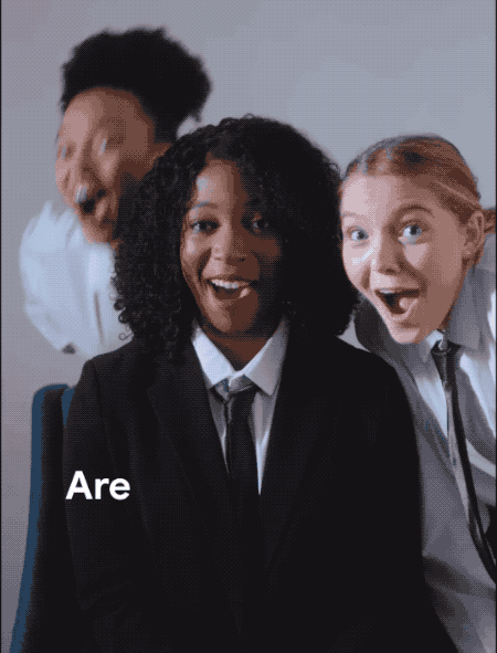 An animated GIF of a video, which shows three people singing "Are you depressed?" then, "or is it just..." then the three of them dancing behind the words "CAPITALISM" spelled out on screen as they dance off screen.