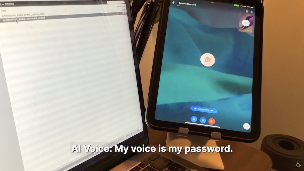 A photo of reporter Joseph Cox playing an AI-generated clip of his voice while on the phone to Lloyds Bank, which it uses to authenticate him.