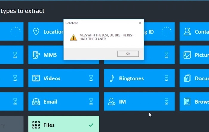A screenshot of a video by Signal CEO with a popup box on a Cellebrite device, saying "Hack the planet!"