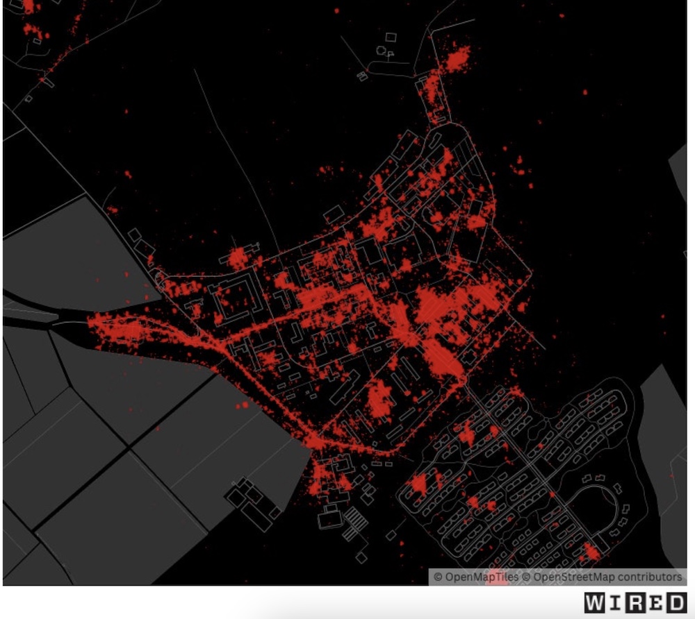 A photo from Wired's story, showing an aerial map of Wiesbaden in Germany in darkness with red dots all over the place, showing U.S. soldiers' locations.