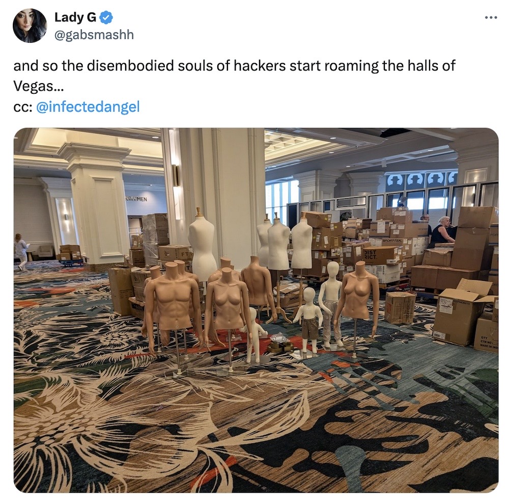 Lady G tweet: "and so the disembodied souls of hackers start roaming the halls of Vegas..." followed by a photo of several dismembered and disconnected mannequin parts, both tops and bottoms, and the occasional head.