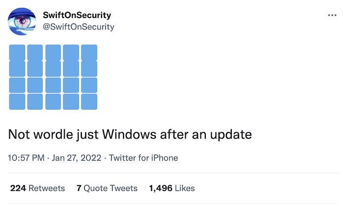 A screenshot of five-by-five blue blocks and the caption, "Not Wordle, just Windows after an update,"