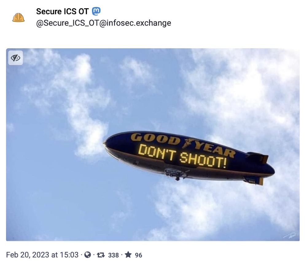 The Goodyear blimp with a giant digital sign that says, "Don't shoot!"